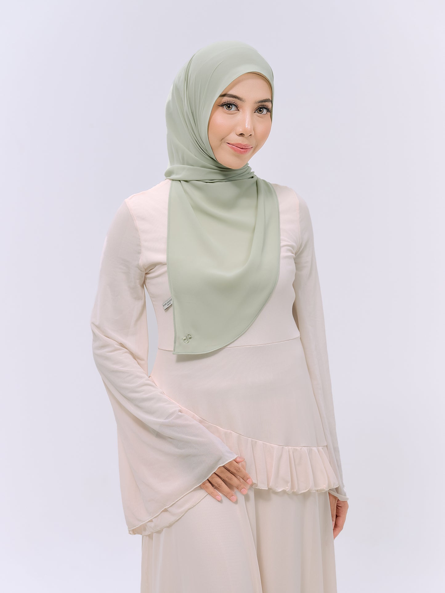 CLAIA IN SAGE GREEN