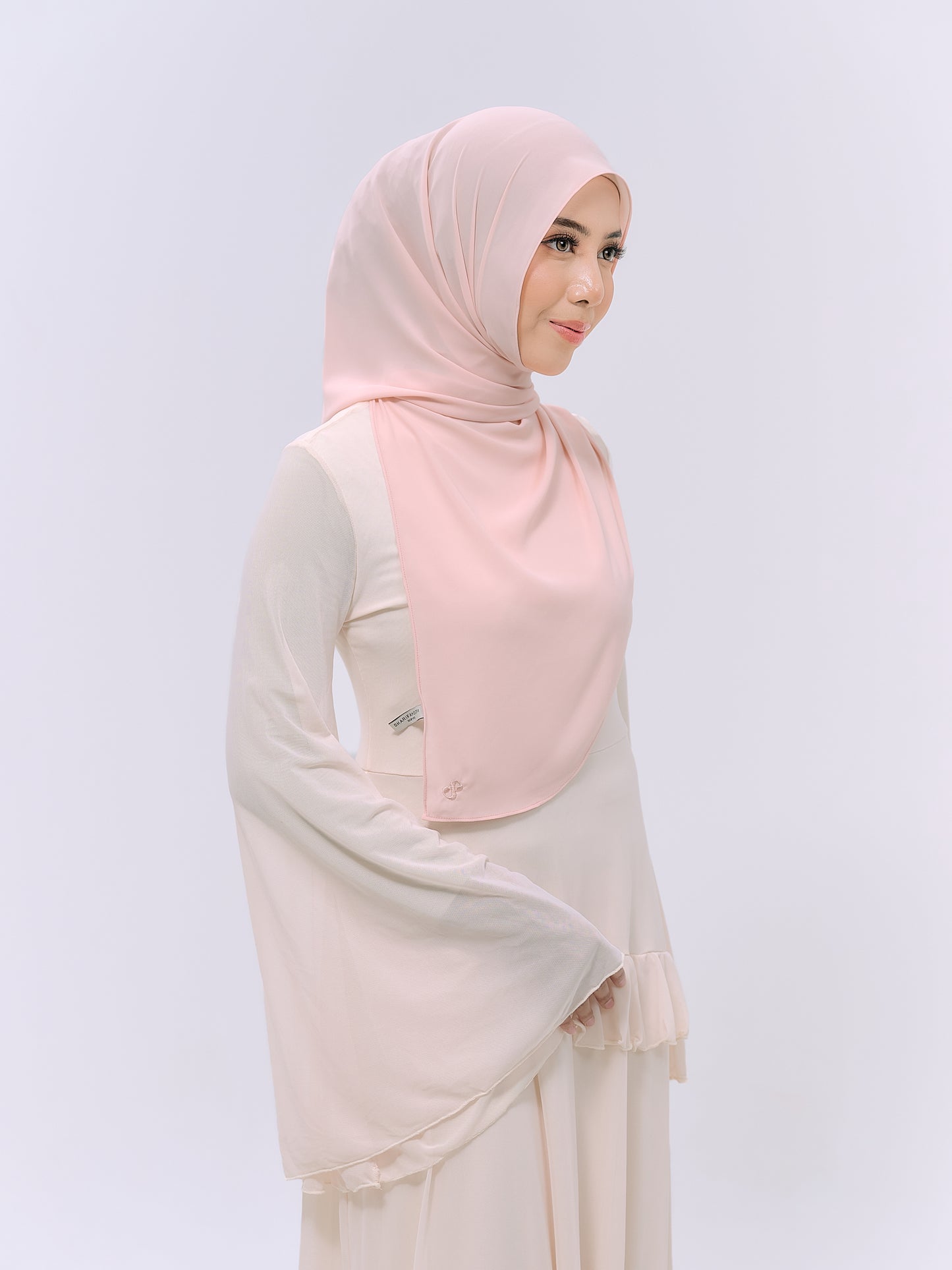 CLAIA IN SOFT PEACH